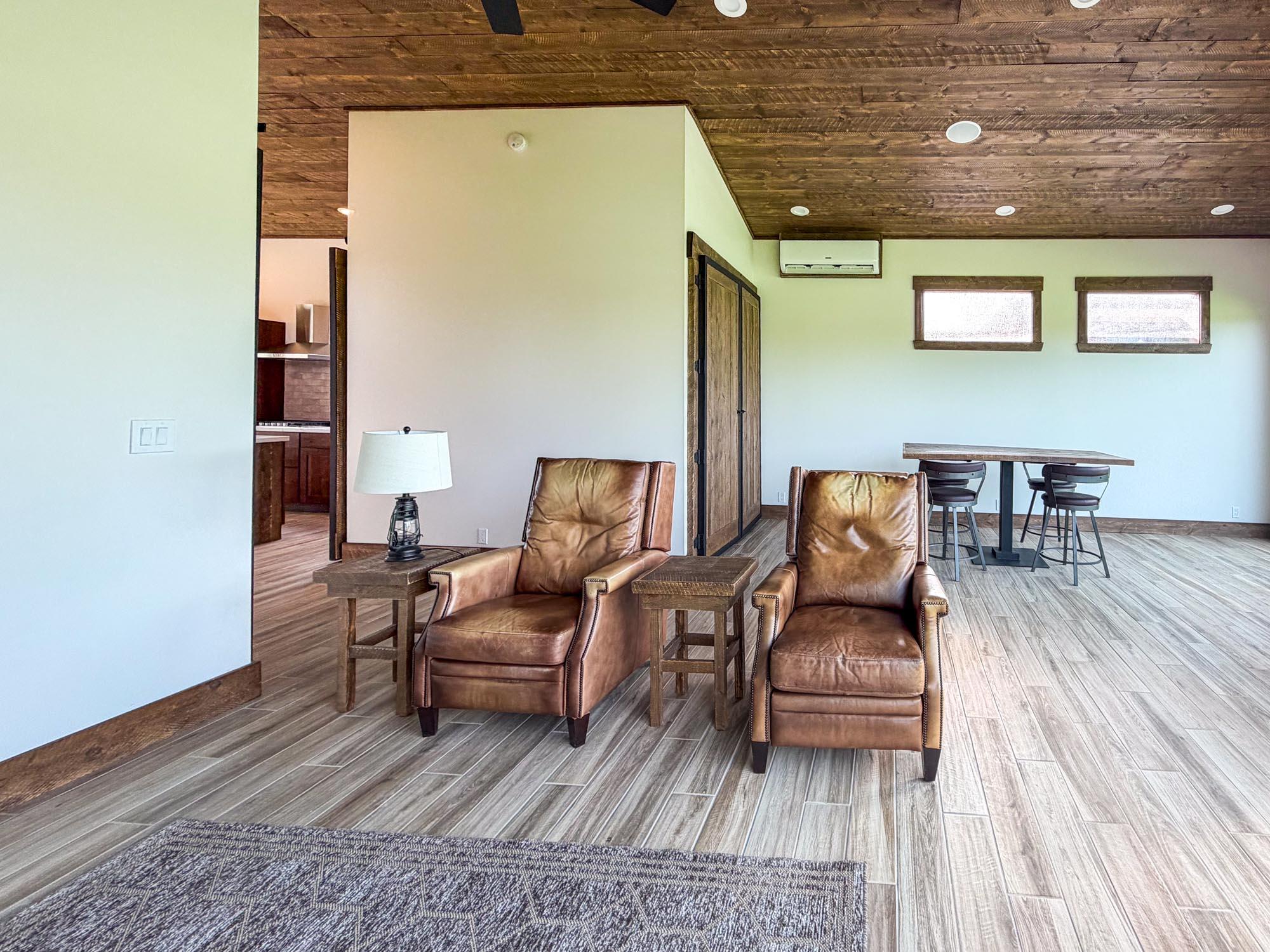 80394 Ave 48, Unit 189 Indio, CA 92201 - Photo 12 of 16 a living room with furniture and wooden floor