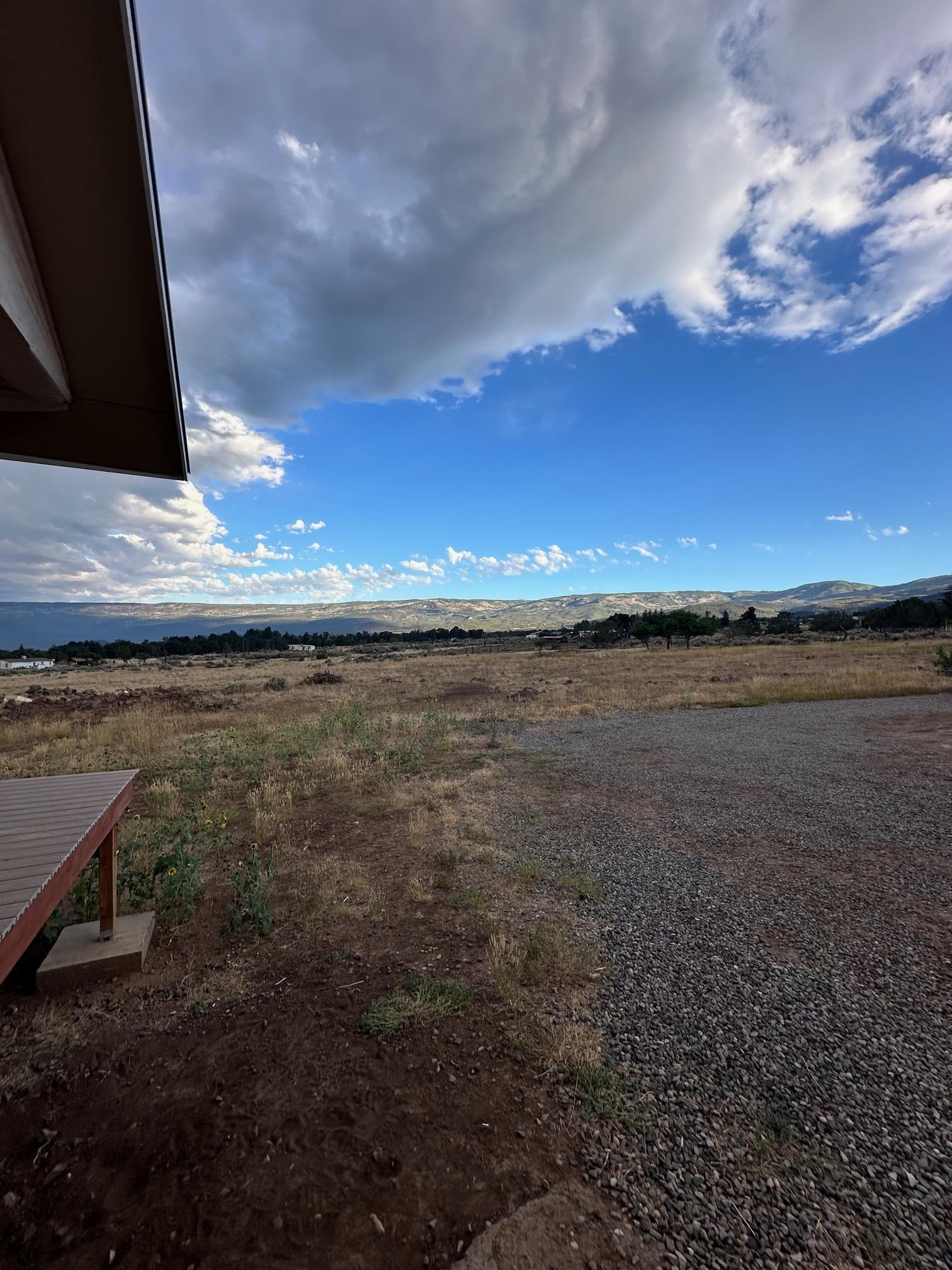 24500 Timothy Road Cedaredge, CO 81413 - Photo 21 of 33 a view of an outdoor space and yard