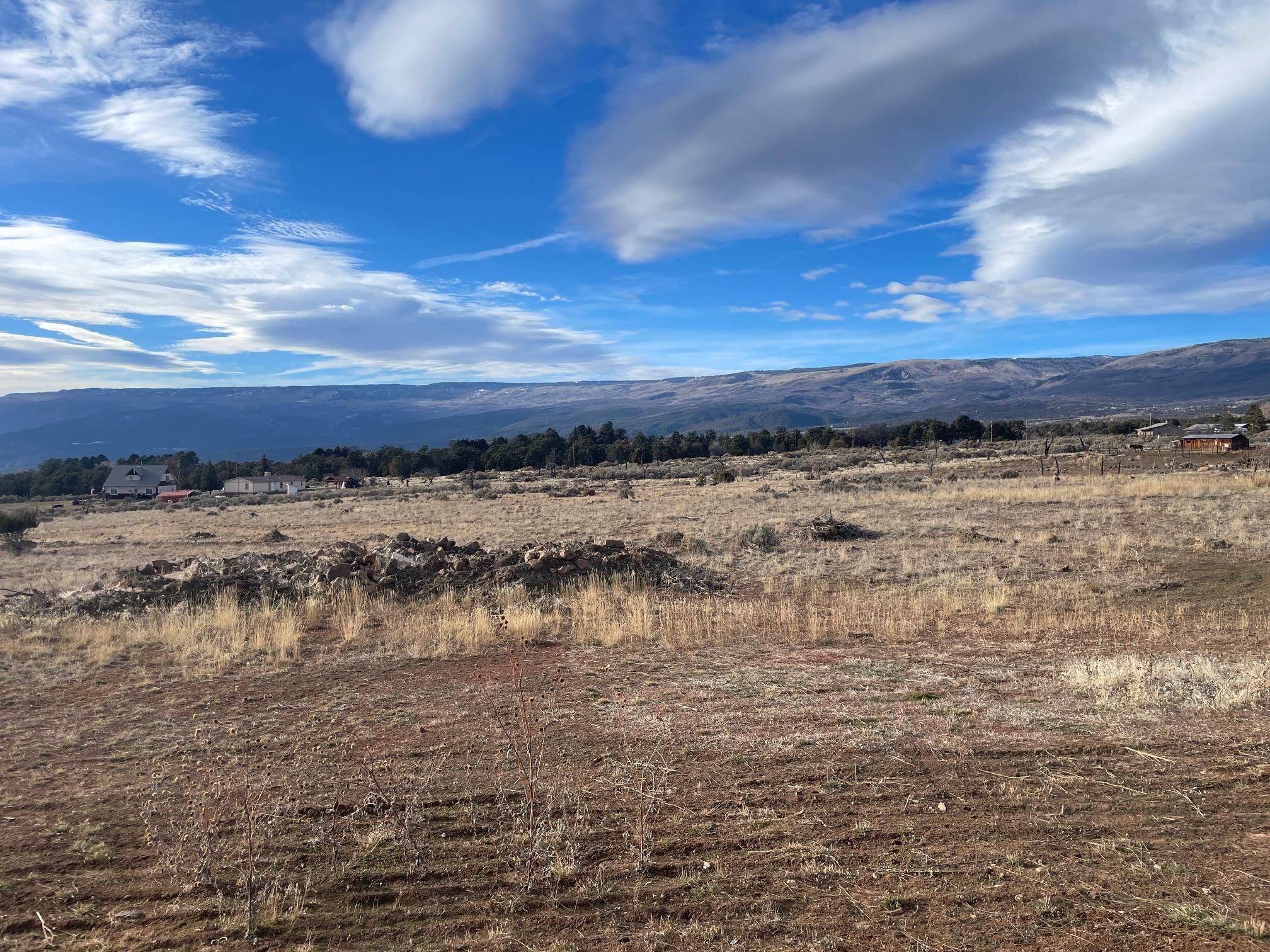 24500 Timothy Road Cedaredge, CO 81413 - Photo 33 of 33 a view of ocean with sunset