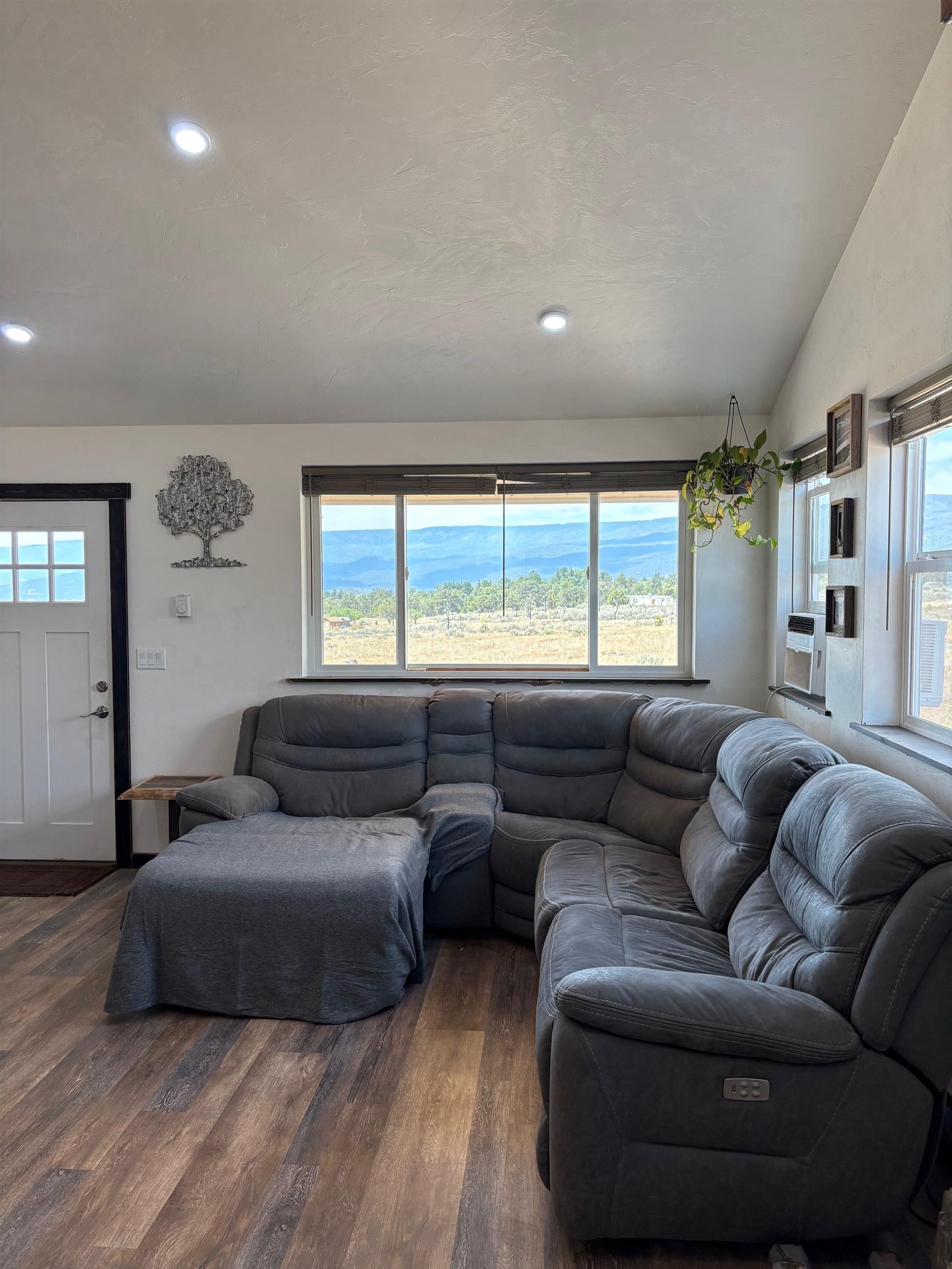 24500 Timothy Road Cedaredge, CO 81413 - Photo 7 of 33 a living room with furniture and a large window