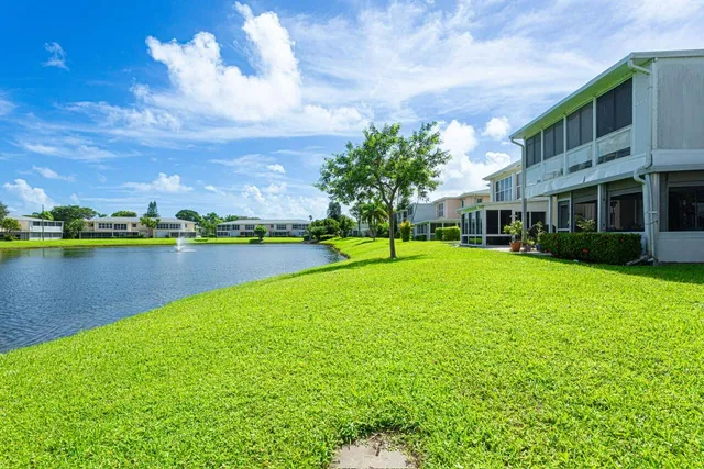 a view of a lake with a building in the background