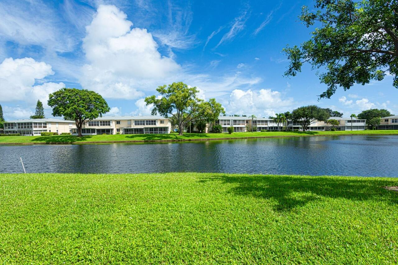 1421 Northwest 19th Terrace, Unit 102 Delray Beach, FL 33445 - Photo 24 of 31 a view of lake
