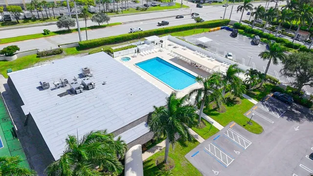 an aerial view of a house with a garden