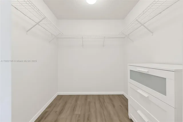 a view of an empty walk in closet