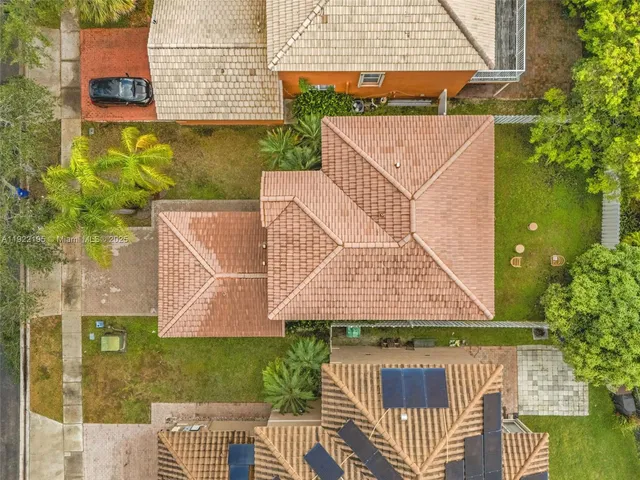 front view of a house with a small yard
