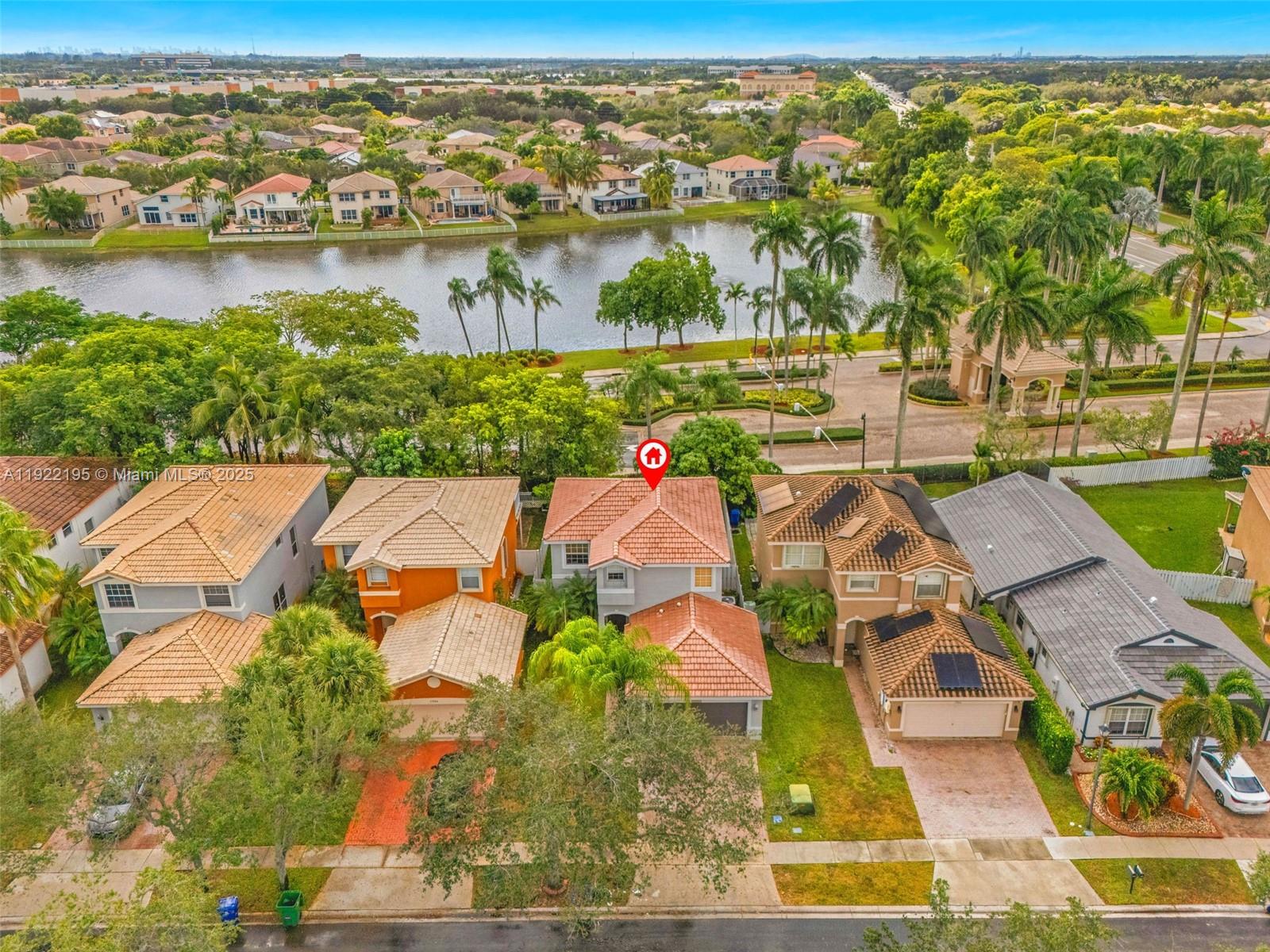 15854 Southwest 21st Street Miramar, FL 33027 - Photo 23 of 23 an aerial view of residential building with outdoor space and lake view