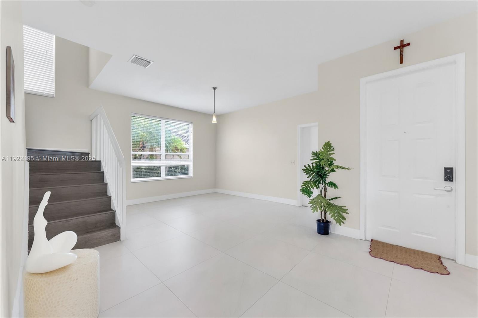 15854 Southwest 21st Street Miramar, FL 33027 - Photo 10 of 23 a view of an empty room with a window