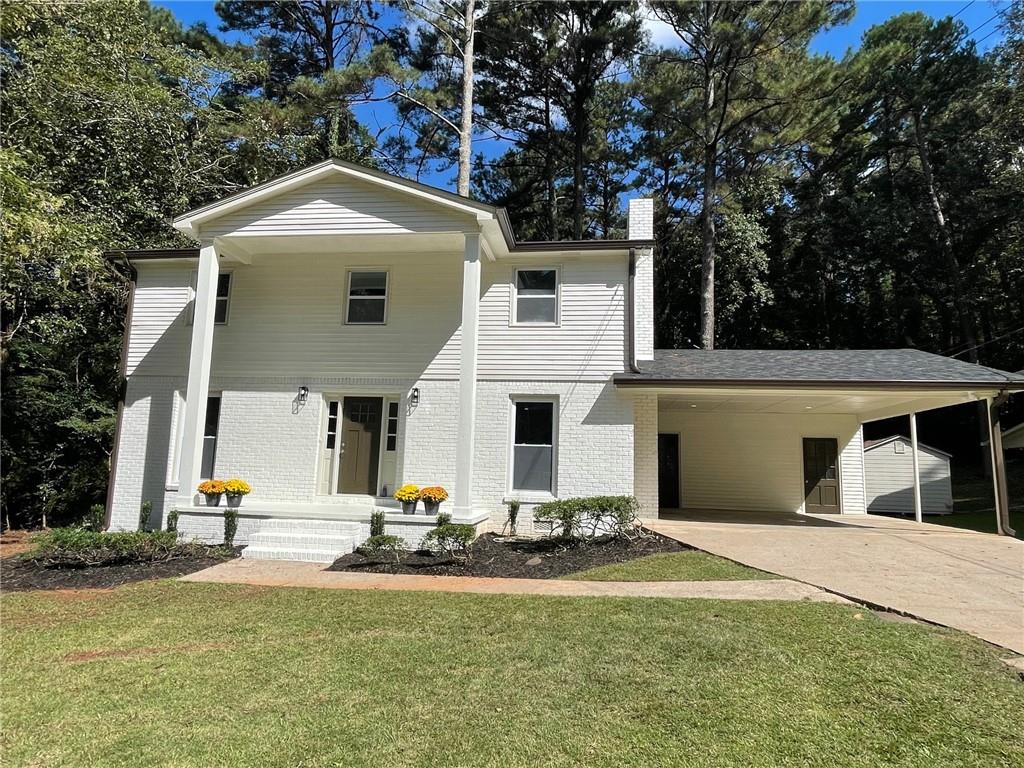 a front view of a house with garage
