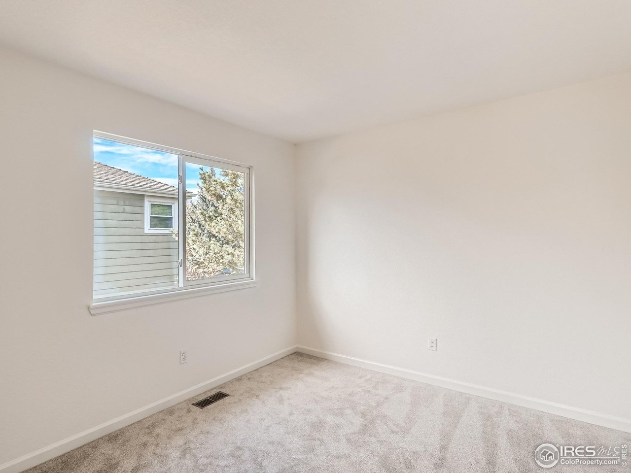 1285 Eldorado Drive Superior, CO 80027 - Photo 15 of 29 an empty room with a window
