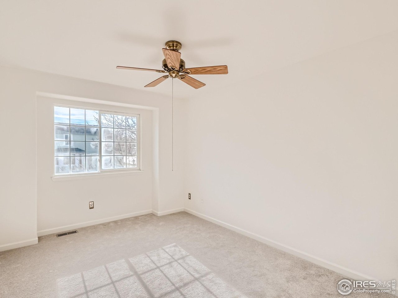 1285 Eldorado Drive Superior, CO 80027 - Photo 16 of 29 a view of a room with window and a ceiling fan