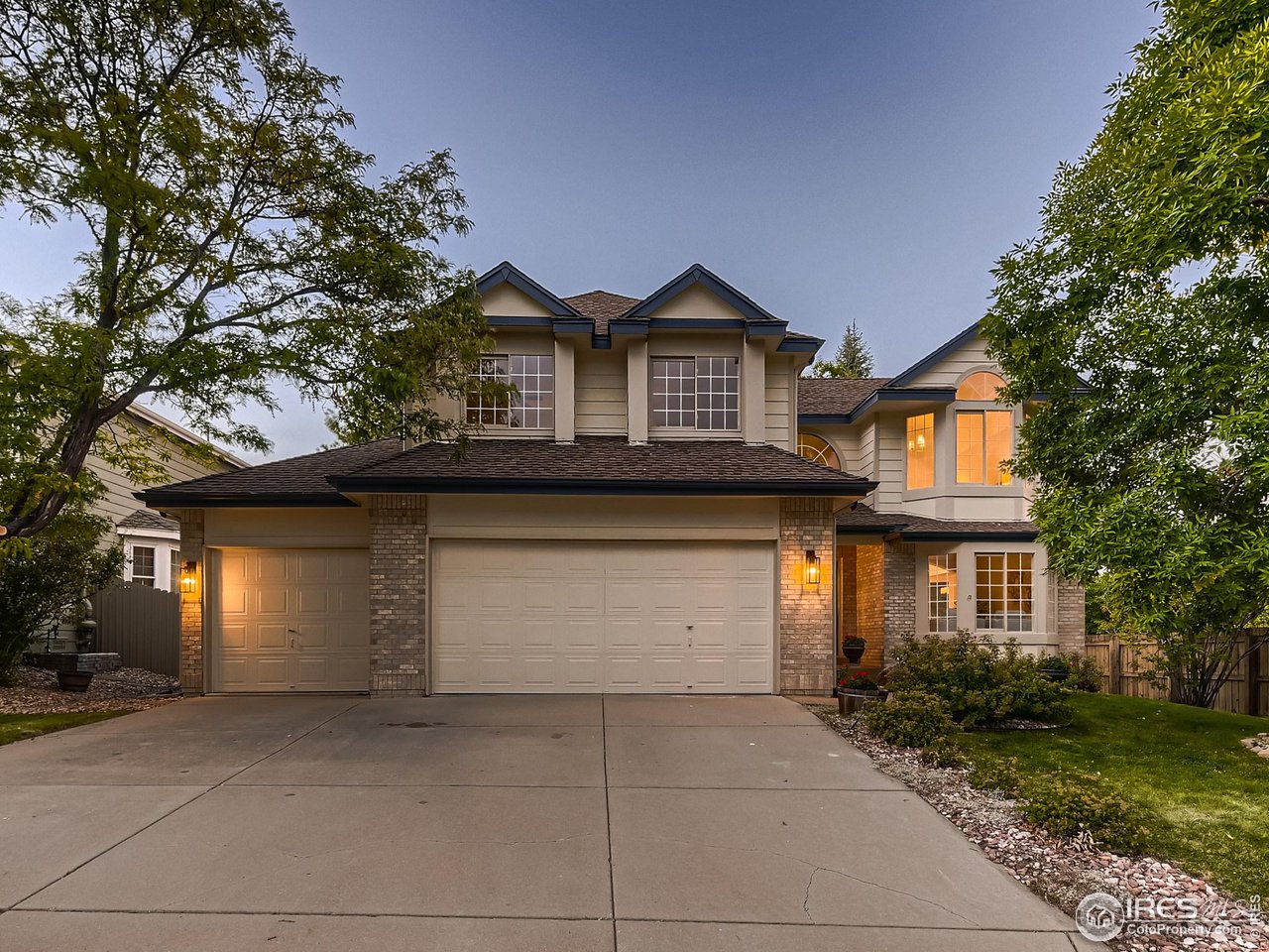1285 Eldorado Drive Superior, CO 80027 - Photo 2 of 29 a front view of a house with yard and garage