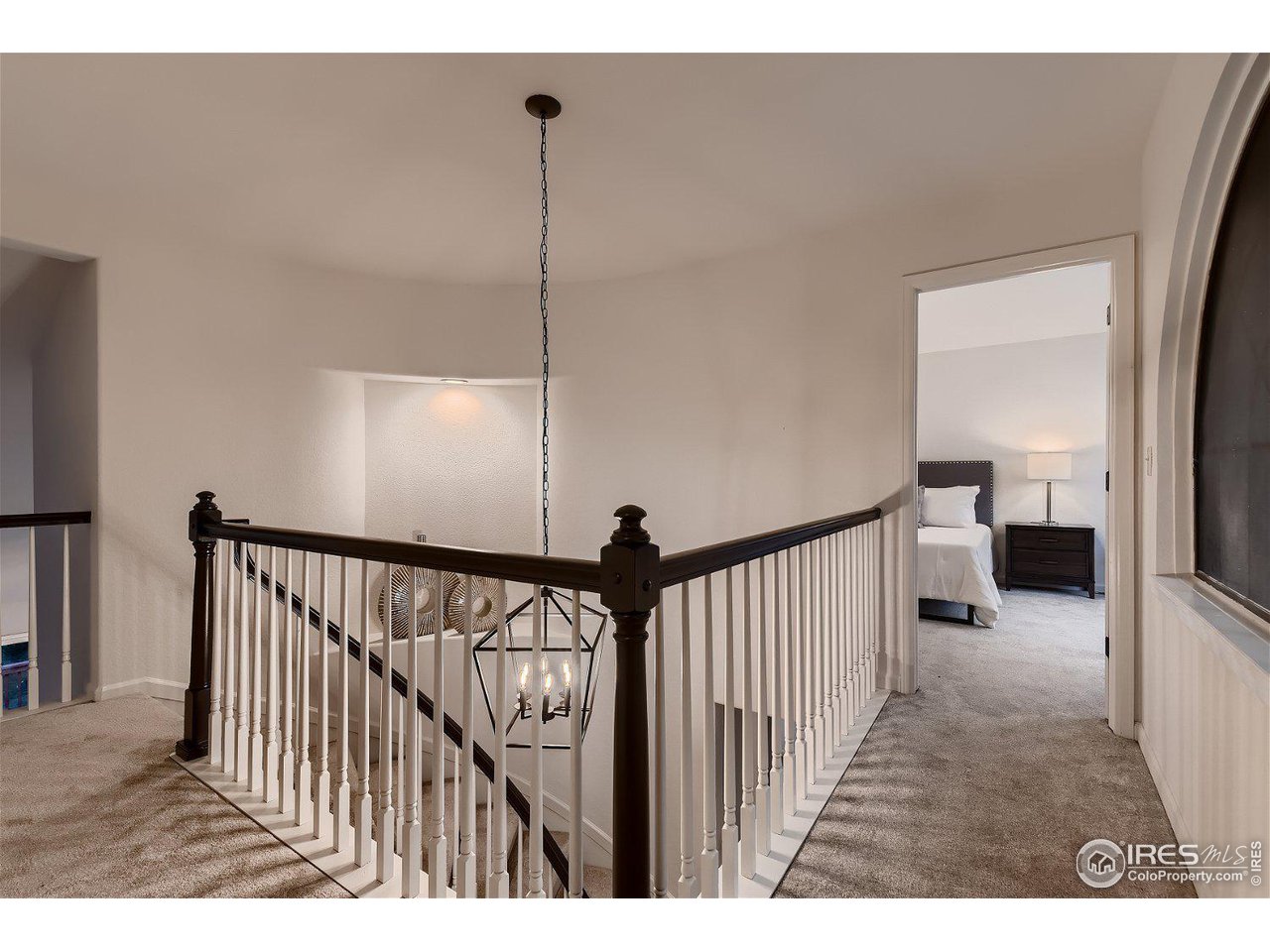 1285 Eldorado Drive Superior, CO 80027 - Photo 22 of 29 a view of a hallway with stairs