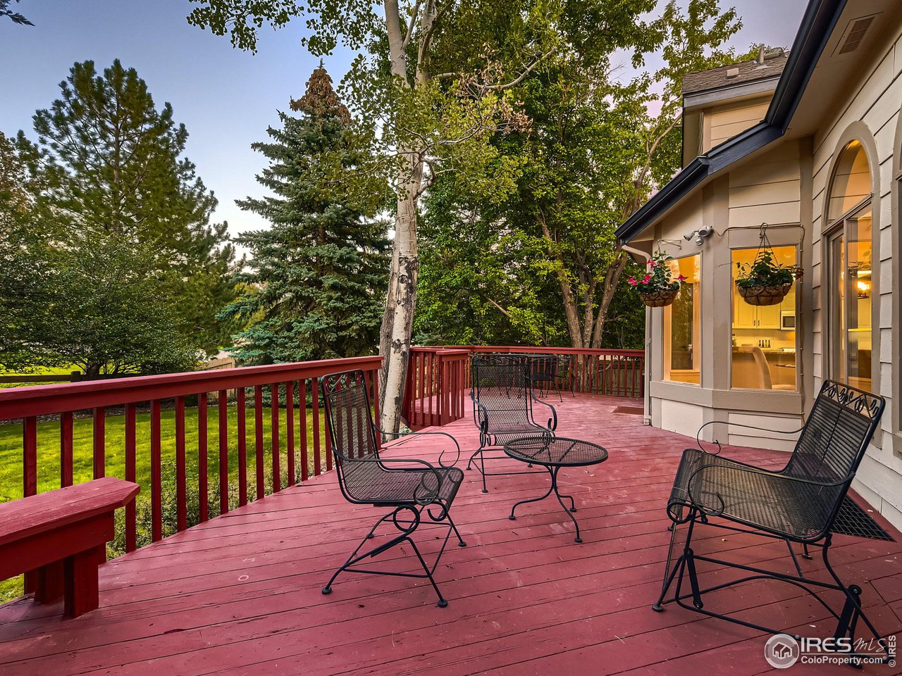 1285 Eldorado Drive Superior, CO 80027 - Photo 27 of 29 a balcony with wooden floor and outdoor seating