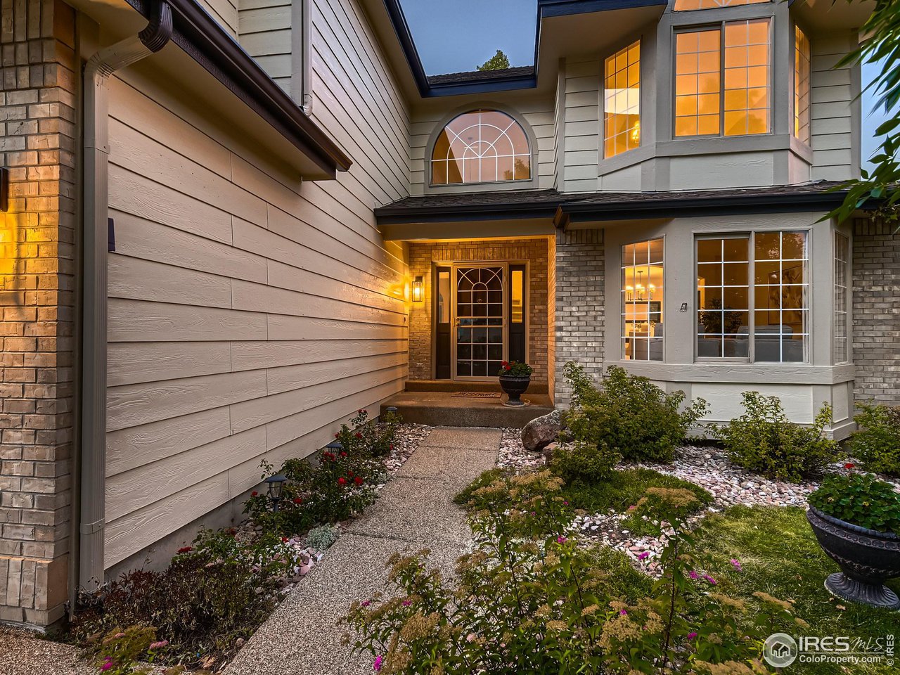 1285 Eldorado Drive Superior, CO 80027 - Photo 3 of 29 a view of a house with potted plants