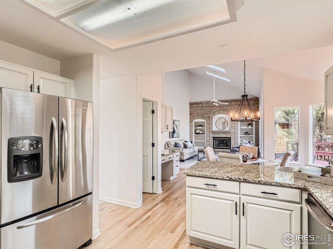 1285 Eldorado Drive Superior, CO 80027 - Photo 8 of 29 a kitchen with stainless steel appliances granite countertop a refrigerator and a sink