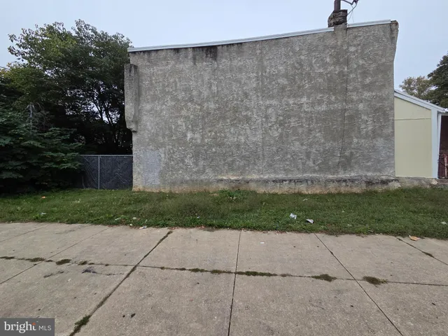 a view of street with parked cars