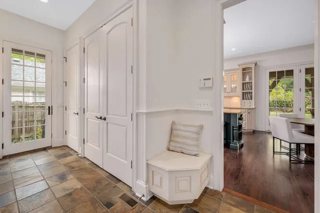 a spacious bathroom with a toilet a sink and a bathtub