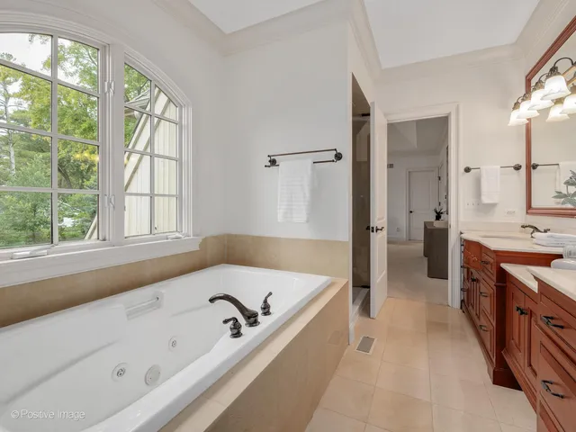 a bathroom with a bathtub and a sink