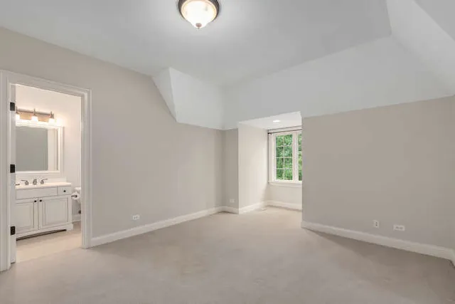 an empty room with a washer and dryer