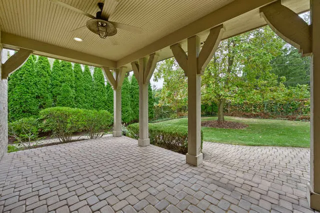 a view of a porch with a garden
