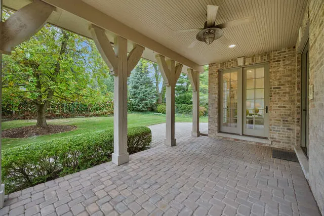 a view of a porch with a garden