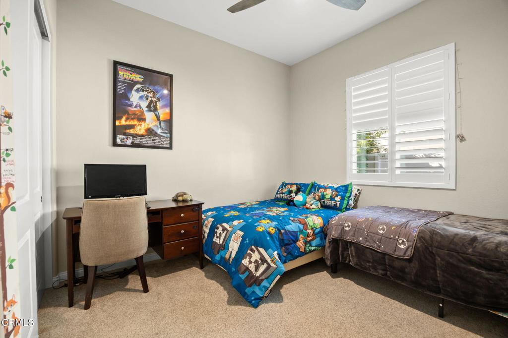 390 Rose Street Fillmore, CA 93015 - Photo 24 of 58 a bedroom with a bed and a window