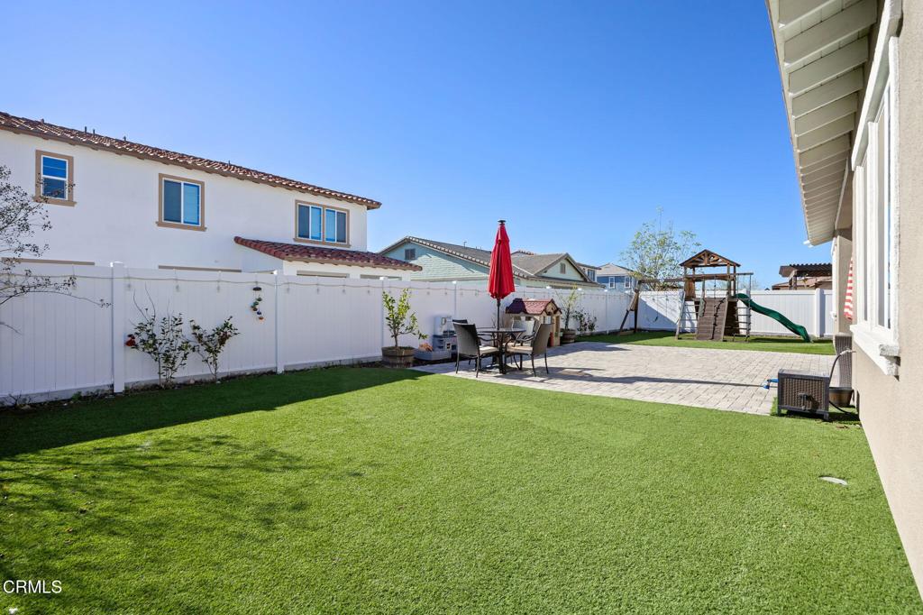390 Rose Street Fillmore, CA 93015 - Photo 38 of 58 a view of an house with backyard porch and furniture