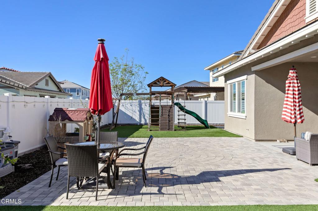 390 Rose Street Fillmore, CA 93015 - Photo 39 of 58 a view of roof deck with table and chairs
