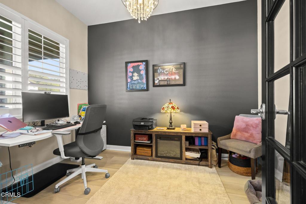 390 Rose Street Fillmore, CA 93015 - Photo 7 of 58 a view of a workspace with furniture and a window