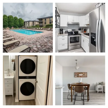 a open kitchen with stainless steel appliances granite countertop a refrigerator and a stove