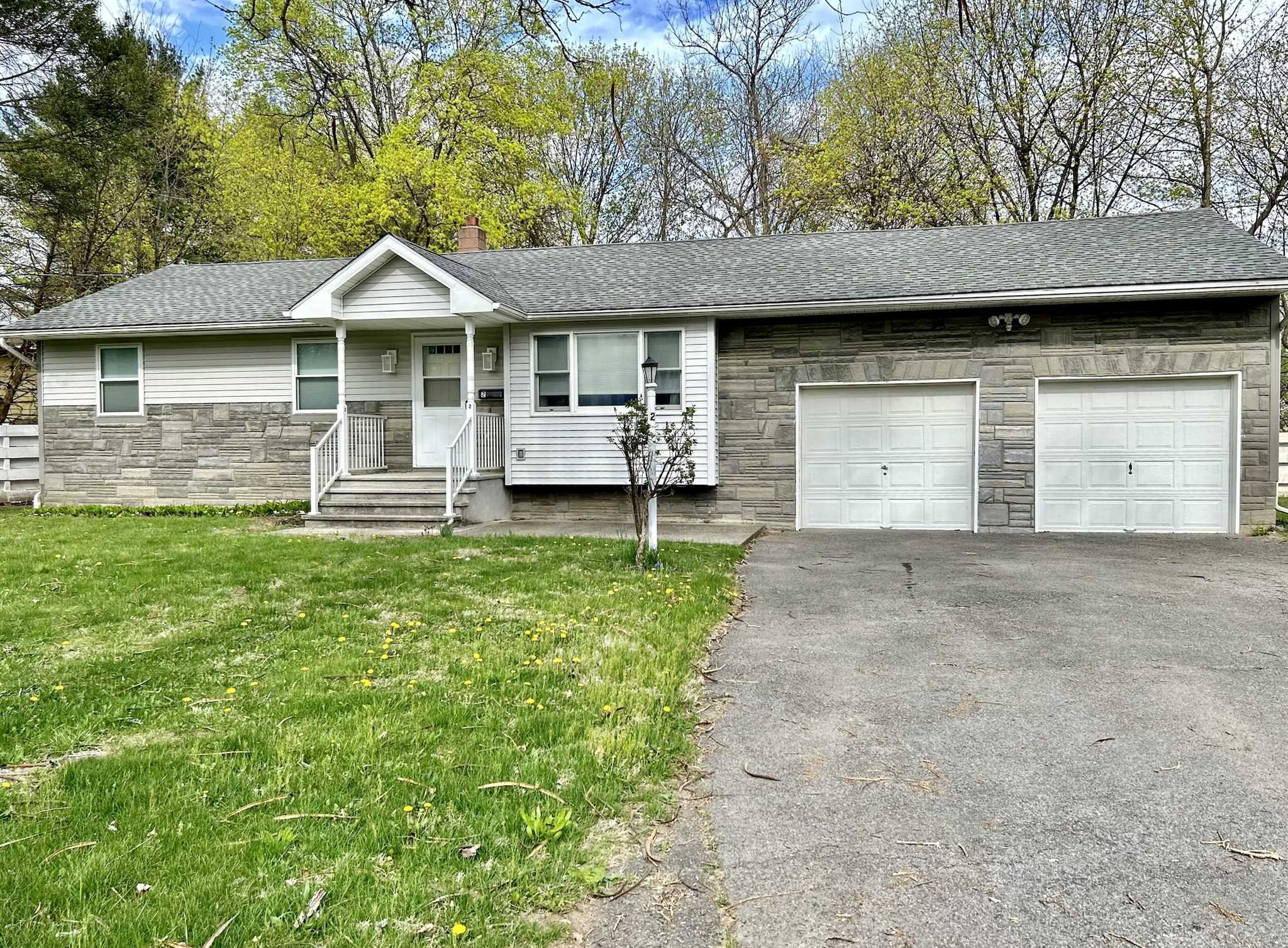 2 Cambridge Drive Red Hook, NY 12571 - Photo 15 of 17 a front view of a house with a yard