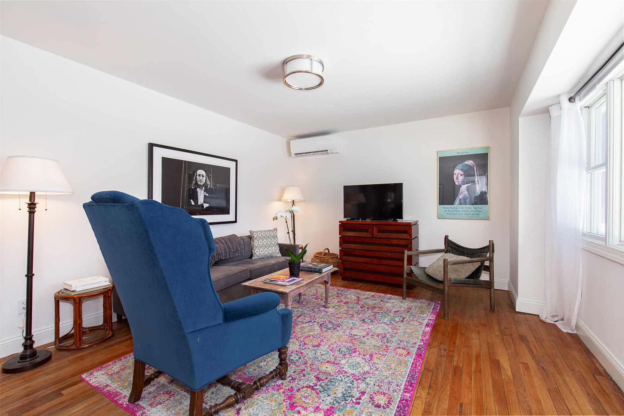 2 Cambridge Drive Red Hook, NY 12571 - Photo 4 of 17 a living room with furniture and a flat screen tv