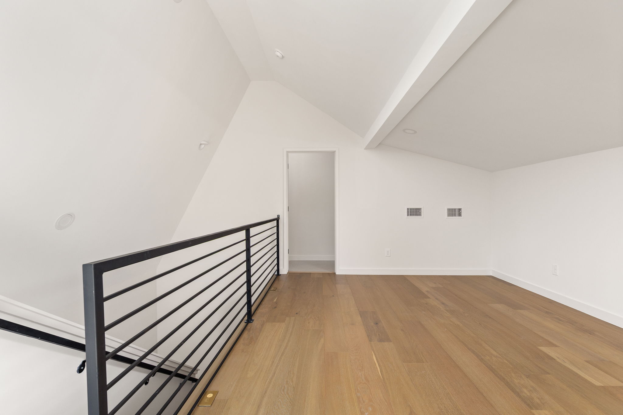 2717 Lyons Road, Unit 1 Austin, TX 78702 - Photo 27 of 40 Lofty ceilings and hardwood flooring define this versatile bonus room, perfect for any need.