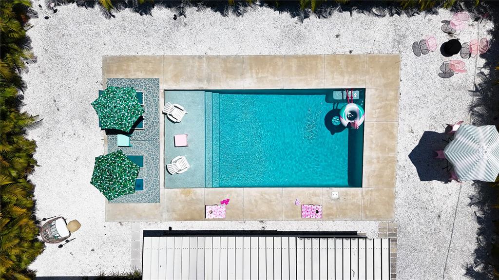 3228 Webber Street Sarasota, FL 34239 - Photo 2 of 39 a bathroom with a sink mirror and vanity
