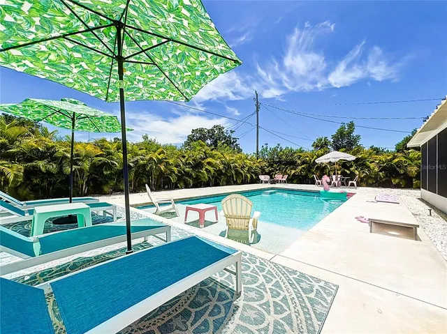 a view of a park with potted plants
