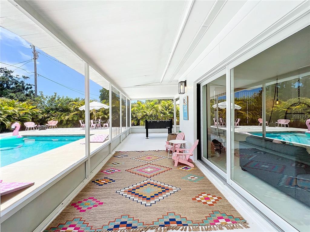 3228 Webber Street Sarasota, FL 34239 - Photo 31 of 39 a front view of a house with a porch