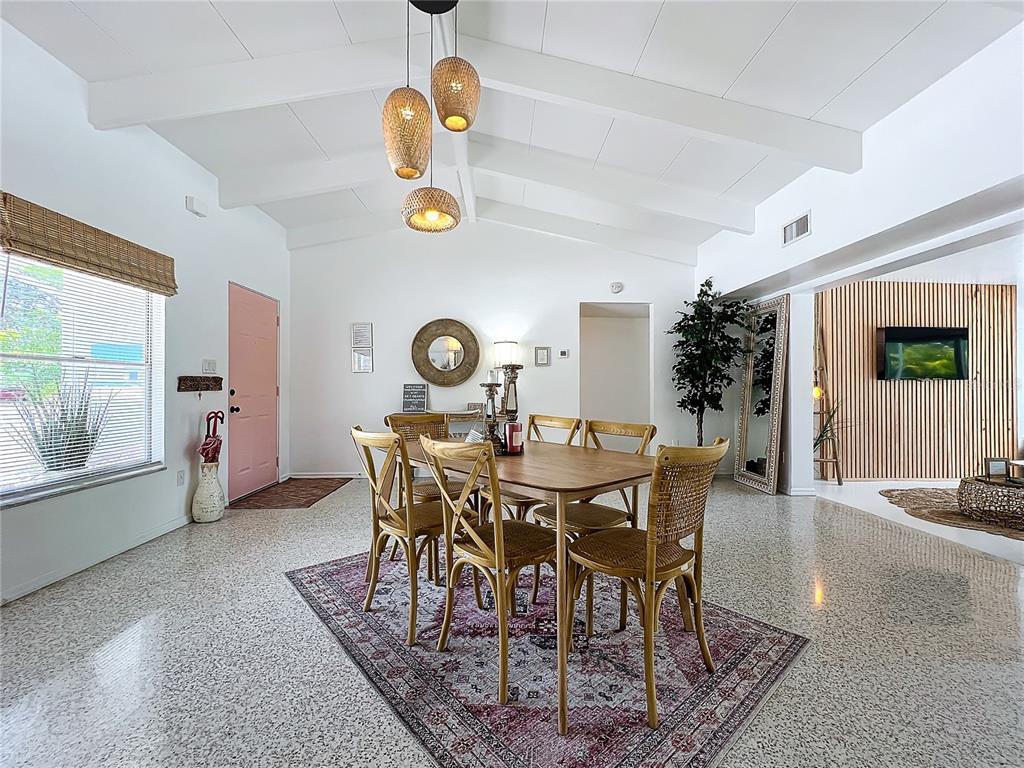 3228 Webber Street Sarasota, FL 34239 - Photo 6 of 39 a view of a dining room and livingroom with furniture