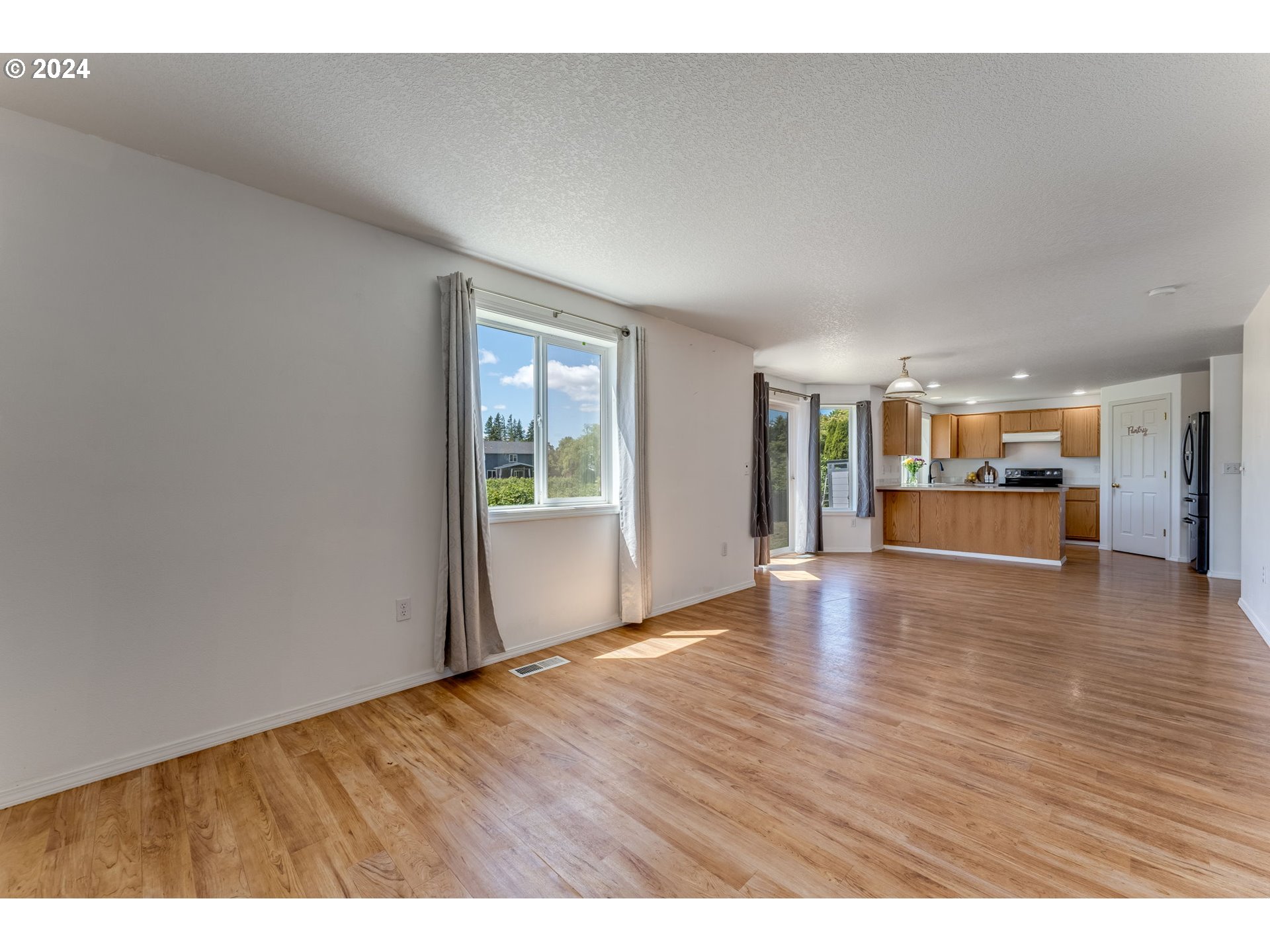 805 Raven Drive Ridgefield, WA 98642 - Photo 13 of 35 a view interior of the house and wooden floor