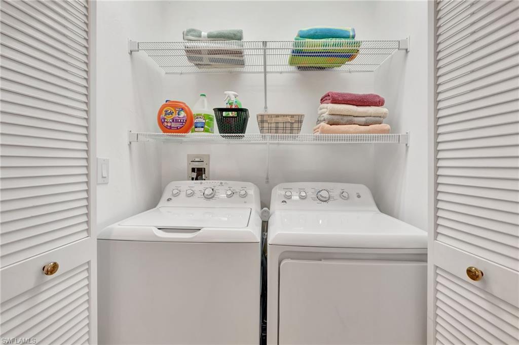 731 Reef Point Circle Naples, FL 34108 - Photo 20 of 47 a utility room with dryer and washer