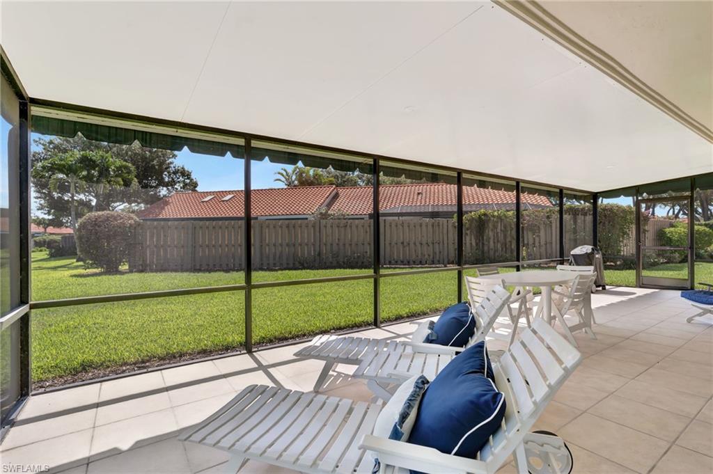 731 Reef Point Circle Naples, FL 34108 - Photo 28 of 47 a view of a back yard from a patio