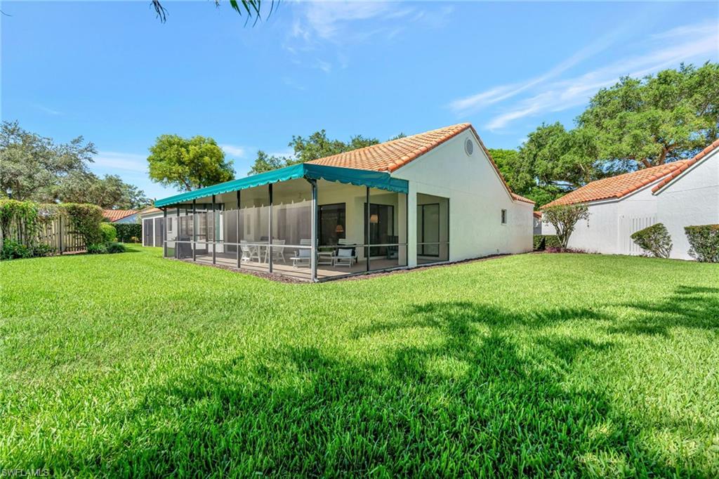 731 Reef Point Circle Naples, FL 34108 - Photo 33 of 47 a view of a house with backyard and porch