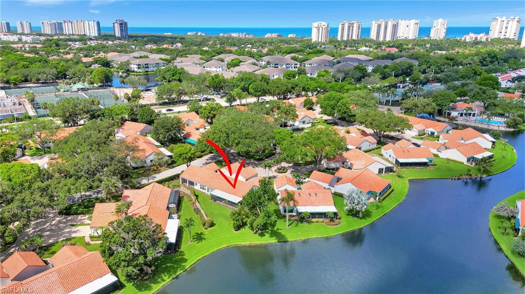 731 Reef Point Circle Naples, FL 34108 - Photo 37 of 47 an aerial view of residential houses with outdoor space and street view