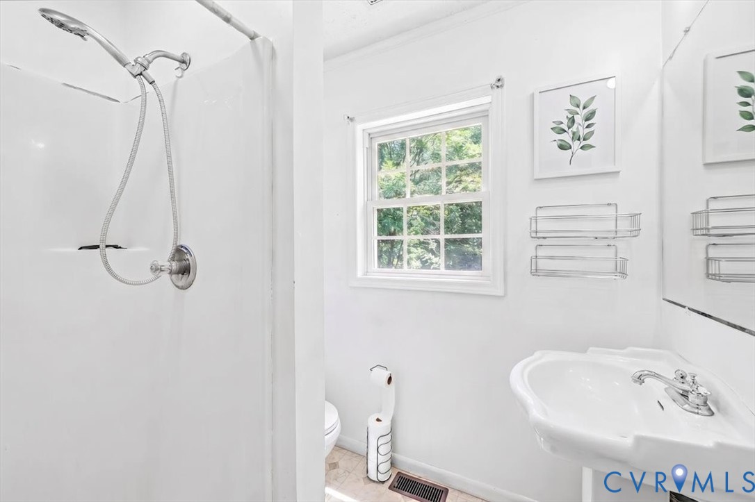 62 The Fls Road Victoria, VA 23974 - Photo 11 of 36 Bathroom featuring a pedestal sink with chrome fau