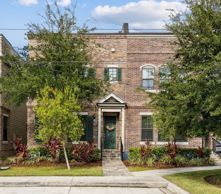 front view of a building with garden