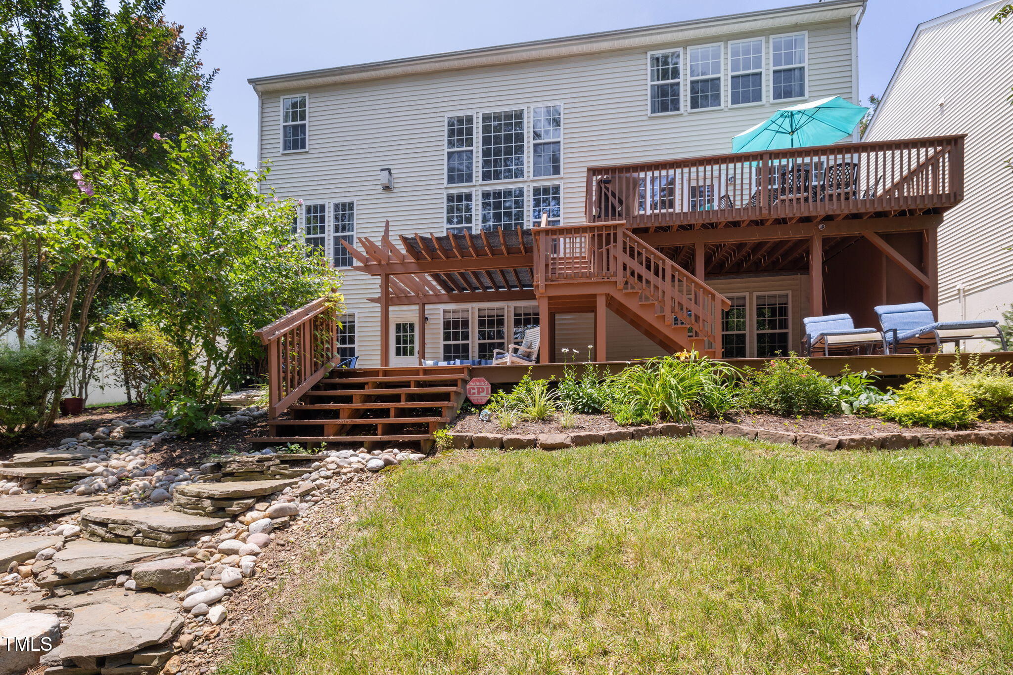 8106 Sommerwell Street Raleigh, NC 27613 - Photo 46 of 61 Stone walkway to water