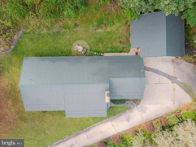 a backyard of a house with seating space
