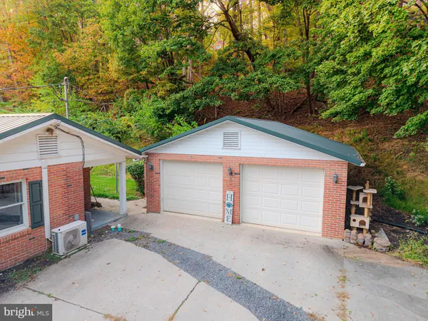 a view of a yard with an outdoor space