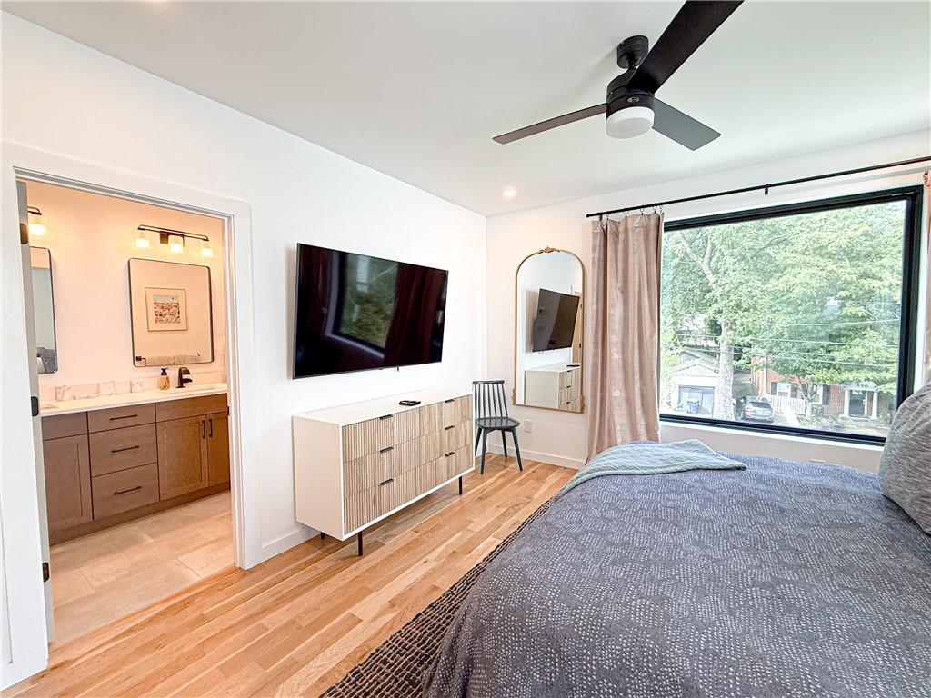 825 Barnett Street Northeast Atlanta, GA 30306 - Photo 12 of 44 a living room with furniture and a flat screen tv