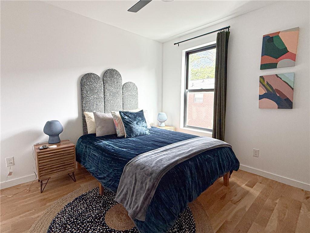 825 Barnett Street Northeast Atlanta, GA 30306 - Photo 15 of 44 a bedroom with bed and a window