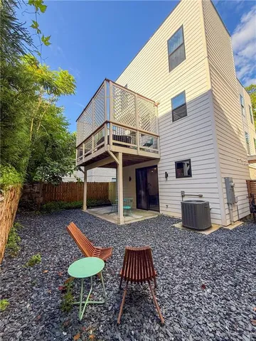a view of a back yard of the house